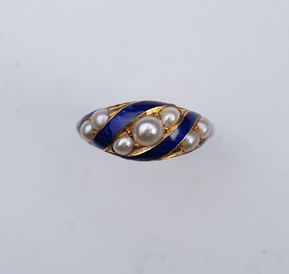 A Victorian half pearl and blue enamel ring, mid 19th century